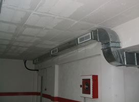 Sistema de extracción en garaje
